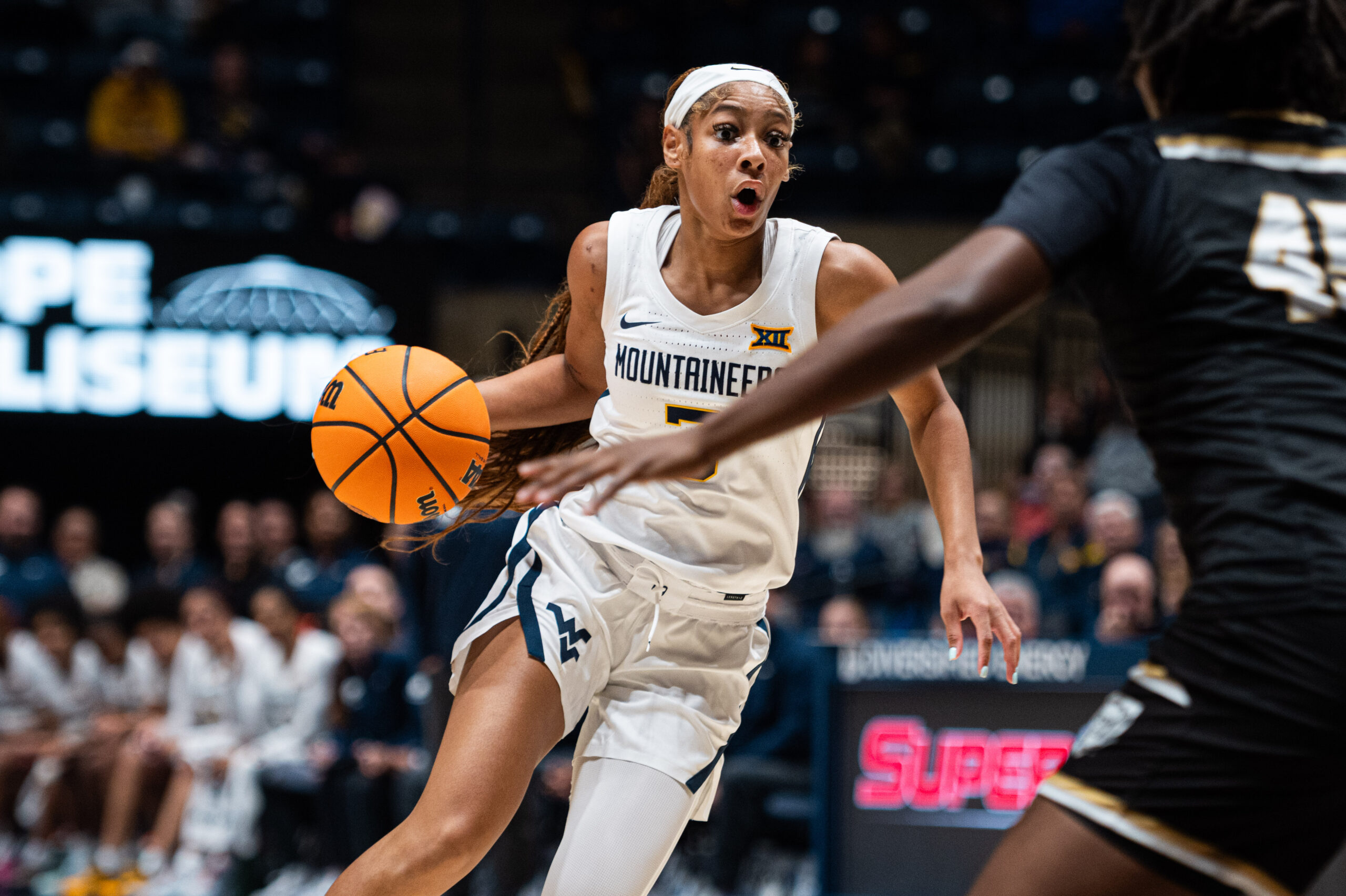 WVU women's basketball surges late to beat Kansas 